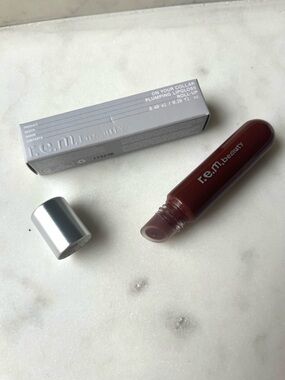 r.e.m. beauty by Ariana Grande, On Your Collar Plumping Lip Gloss “Rollup” Shade